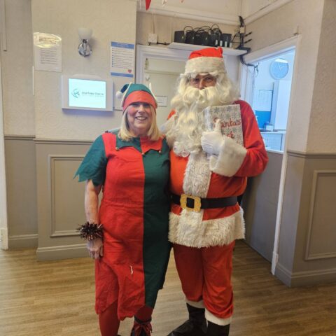 Residents, families and staff enjoying the Christmas Party at Nightingale Care Home