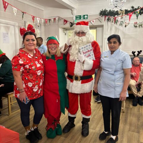 Residents, families and staff enjoying the Christmas Party at Nightingale Care Home