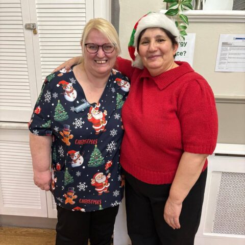 Residents and visitors gathered during the Christmas party at Nightingale House