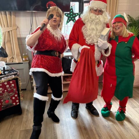 Festive Christmas party fun with residents and guests at Nightingale House