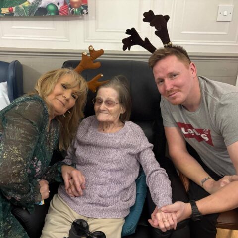 Residents enjoying a festive Christmas celebration together at Nightingale House
