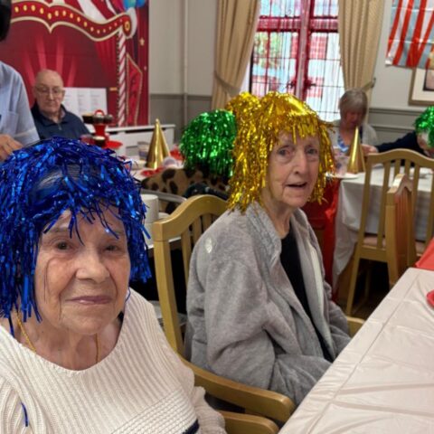 Residents enjoying the circus performance at Nightingale Care Home
