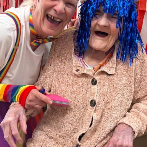 Residents enjoying the circus performance at Nightingale Care Home