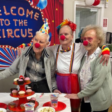 Residents enjoying the circus performance at Nightingale Care Home