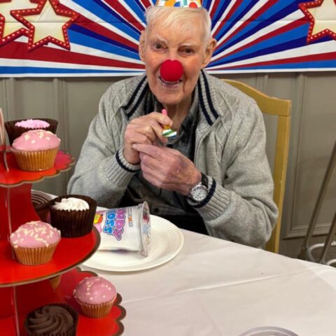 Residents enjoying the circus performance at Nightingale Care Home