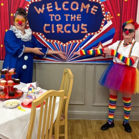 Residents enjoying the circus performance at Nightingale Care Home