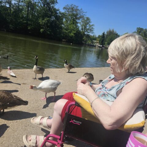 Nightingale Care Home residents spending time outdoors during a park outing