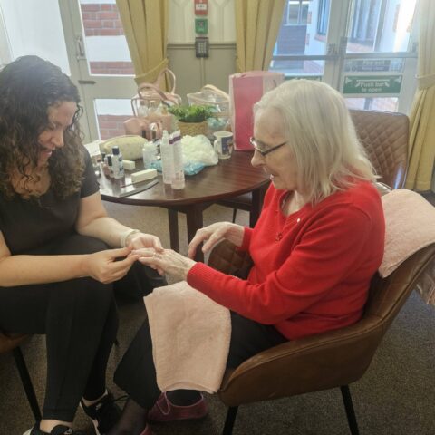 Resident enjoying a pamper session at Nightingale House