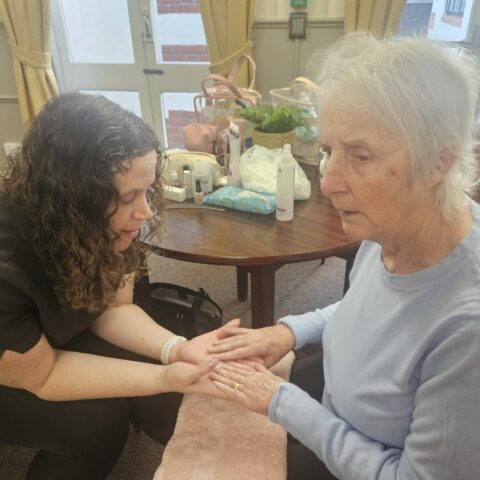 Resident enjoying a pamper session at Nightingale House