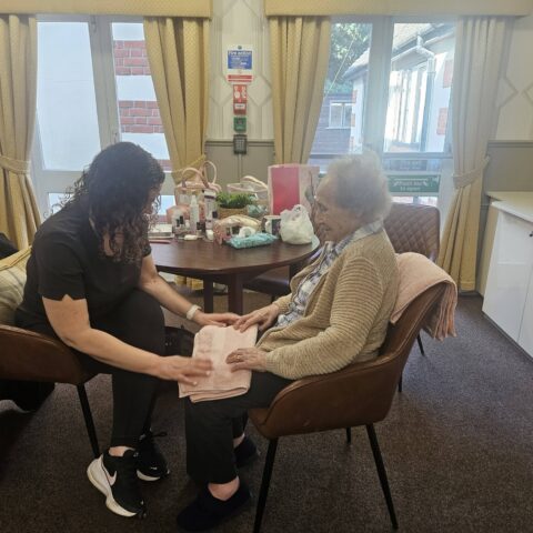 Resident enjoying a pamper session at Nightingale House