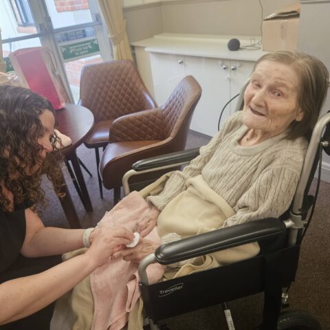 Resident enjoying a pamper session at Nightingale House