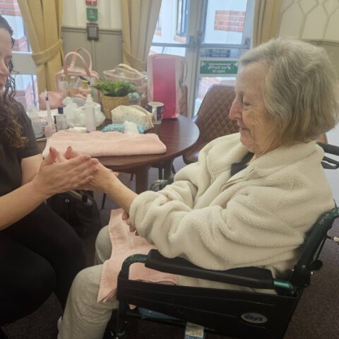 Resident enjoying a pamper session at Nightingale House