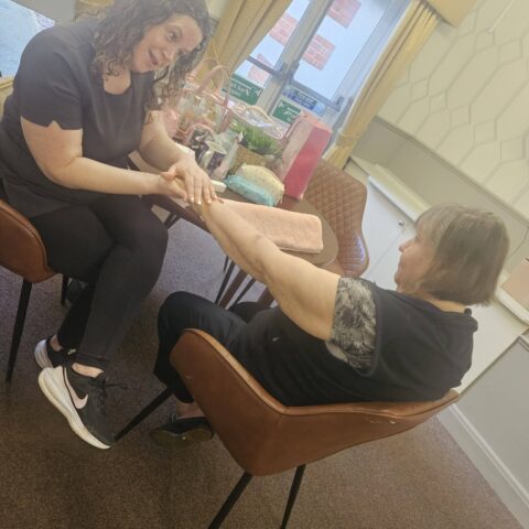 Resident enjoying a pamper session at Nightingale House