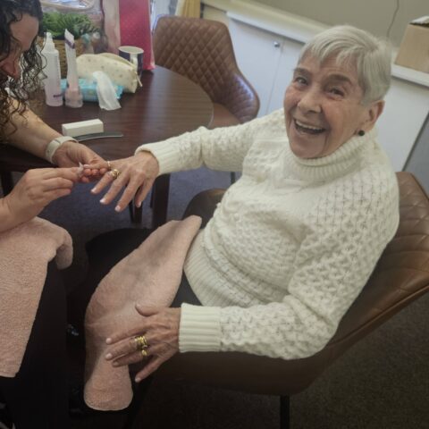 Resident enjoying a pamper session at Nightingale House