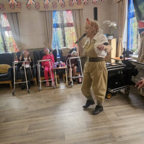 Residents and staff celebrating VE Day at Nightingale House