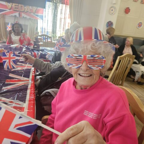 Residents and staff celebrating VE Day at Nightingale House