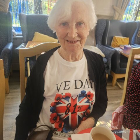 Residents and staff celebrating VE Day at Nightingale House