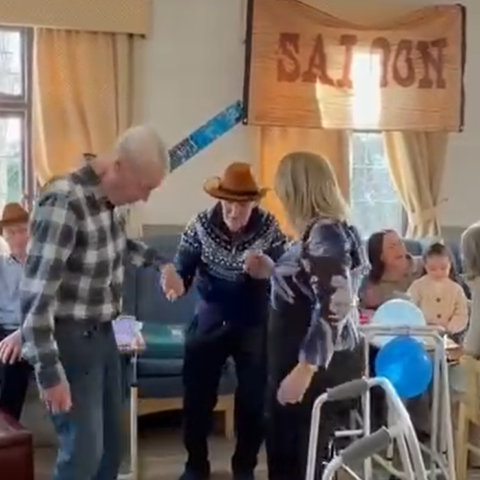 Residents enjoying a Wild West themed afternoon with live entertainment at Nightingale Care Home