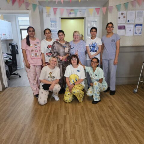 Residents and staff taking part in Sponsored PJ Day at Nightingale House