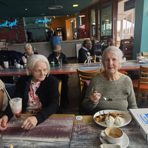 Nightingale House residents enjoying their Southend-on-Sea seaside outing