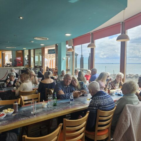 Nightingale House residents enjoying their Southend-on-Sea seaside outing